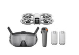 FPV goggles with head strap, handheld controller, and two spare batteries