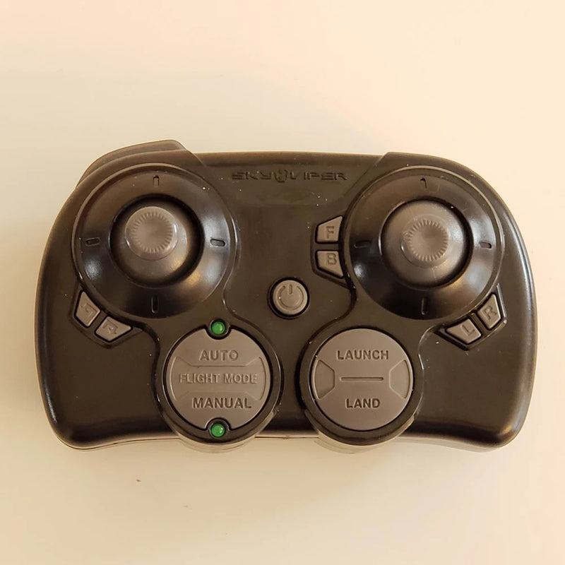 Drone remote controller with dual thumb joysticks and Auto, Flight Mode, Launch, Land buttons