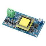 DC boost converter module PCB with yellow transformer and green screw terminal block