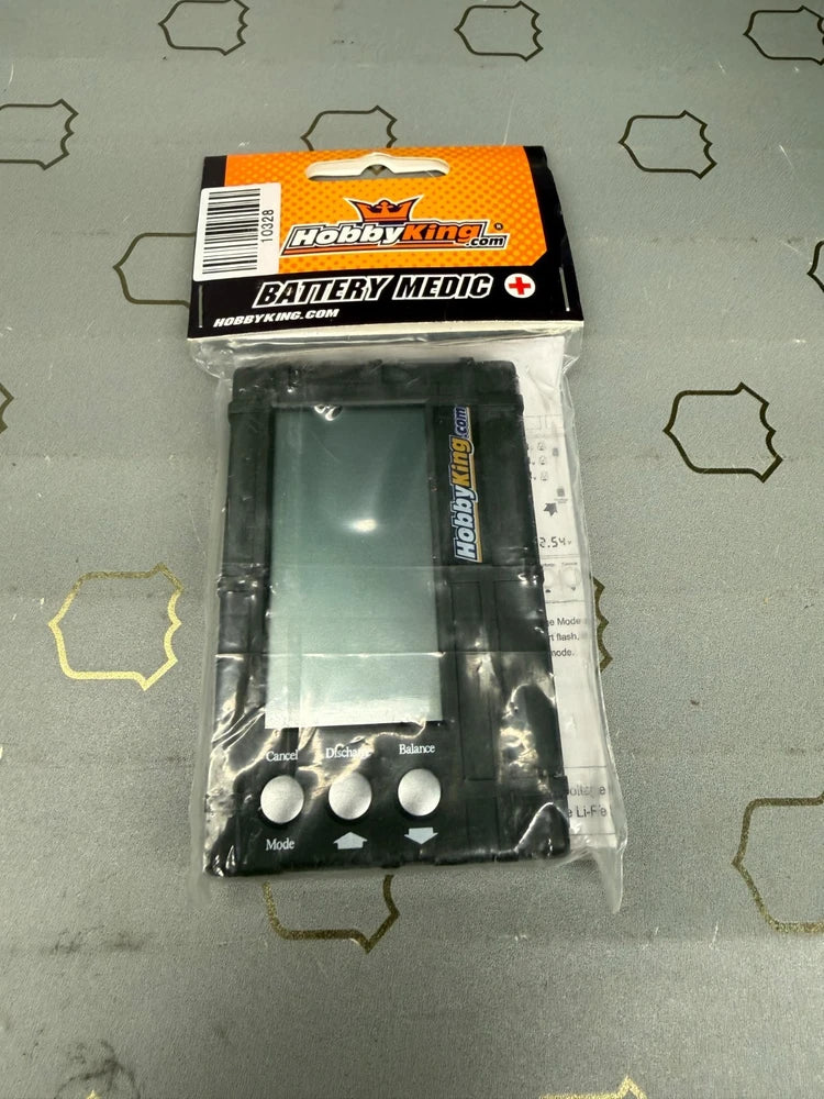 Hobby King Battery Medic LiPo balancer in clear blister pack with orange label