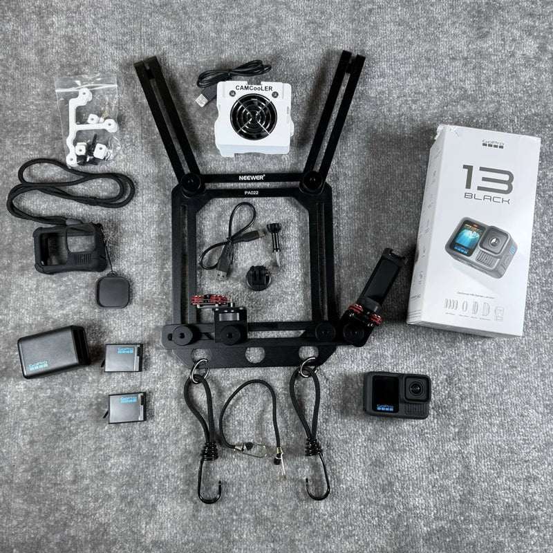 GoPro HERO13 Black waterproof action camera kit with camera and mounted accessories