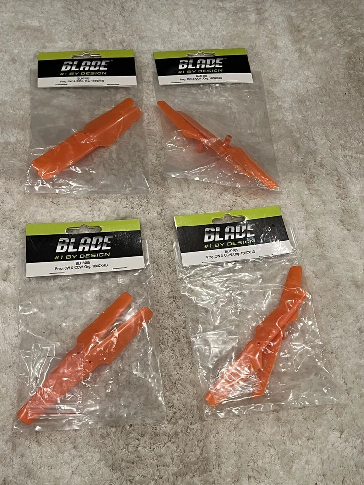 Orange drone propeller blades set, 8 CW/CCW blades in sealed packaging