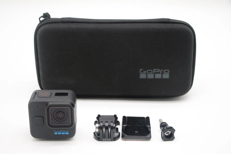 GoPro HERO11 mini action camera in black with protective case and mounting accessories