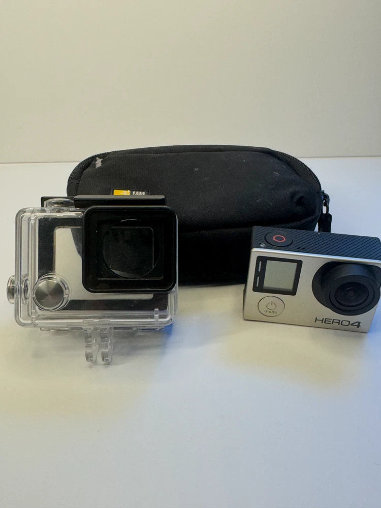 Silver GoPro HERO4 action camera in clear waterproof housing, black front screen