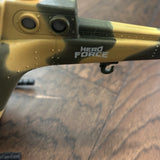 Toy helicopter with 'HERO FORCE' logo on fuselage, side view.