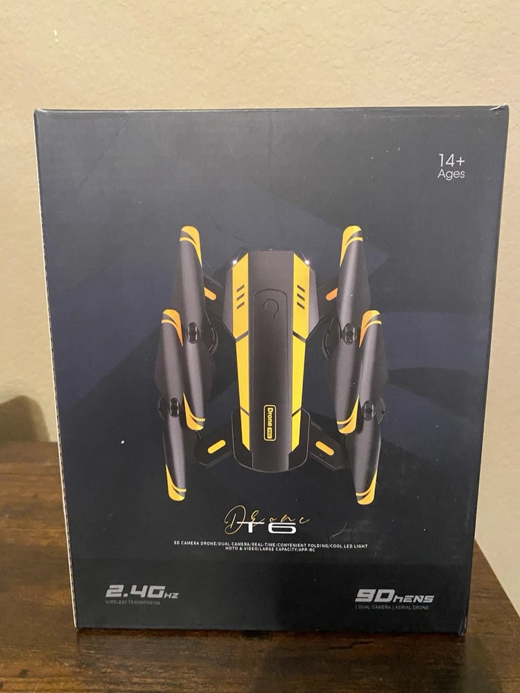 Quadcopter drone retail box with yellow-and-black drone graphic