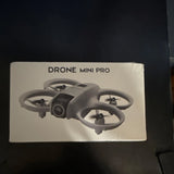 Drone Mini Pro retail box with pictured quadcopter drone
