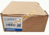 Omron CJ1W-SCU41-V1 PLC processor module in cardboard shipping box with blue label