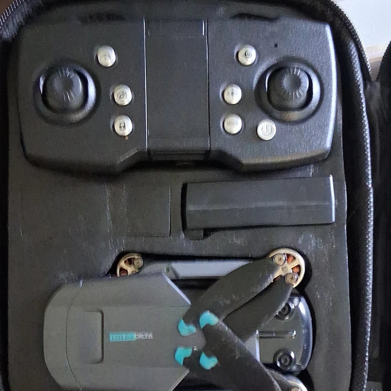 Four-axis GPS drone with remote controller and propellers