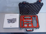 4K camera drone in protective hard case with foam compartments and accessories