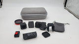 360 action camera bundle with black camera module, lens, straps, and gray hard case