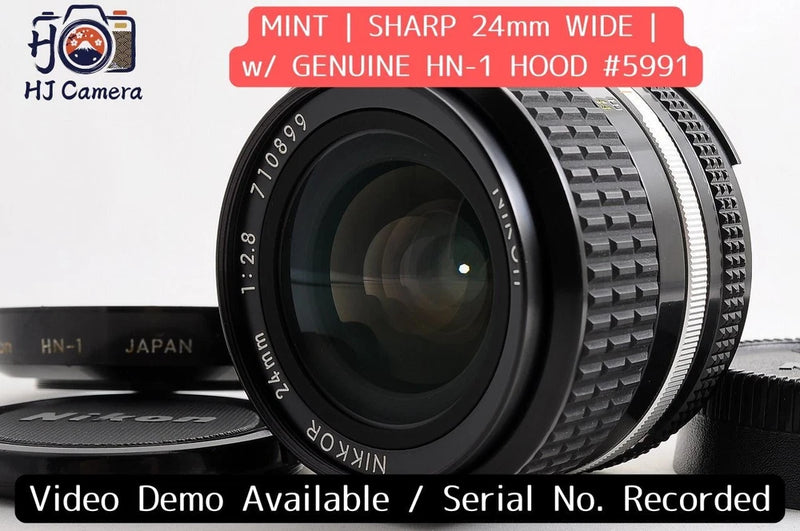 Nikon AI-S AIS Nikkor 24mm f/2.8 wide-angle manual prime lens with mint HN-1 hood