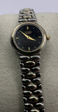 Citizen Quartz ladies dress watch with black dial and silver link bracelet