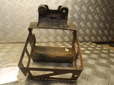 Motorcycle battery tray holder with rusted metal bracket and mounting posts
