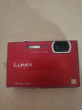 Red panasonic digital camera tested working battery and charger