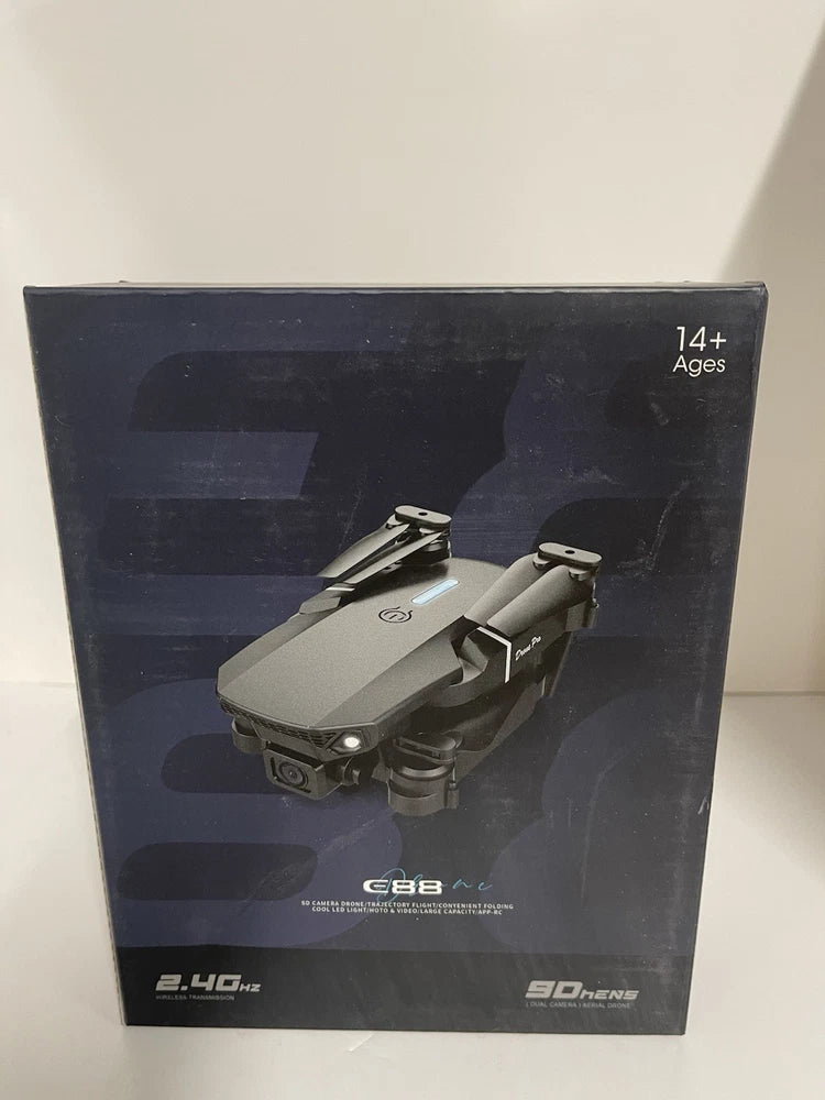 E88 Pro drone in retail box, gray quadcopter with folded arms