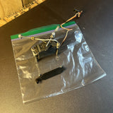 RC throttle servo linkage assembly with wires, metal bracket, and controller in bag