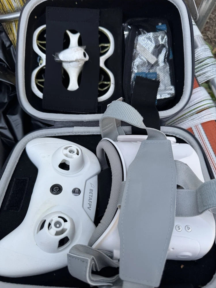 White FPV remote controller and goggles in soft case