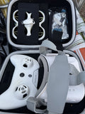 White FPV remote controller and goggles in soft case