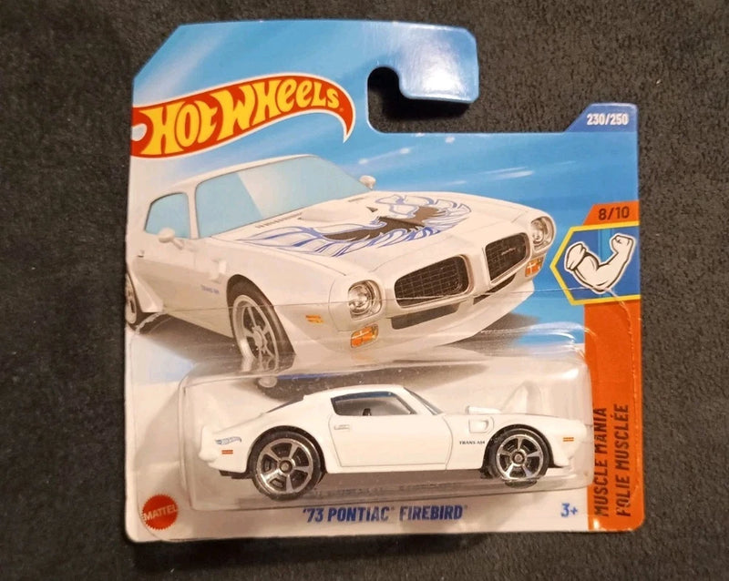 Hot Wheels Firebird 1:64 die-cast model car in blister pack, white with blue stripes