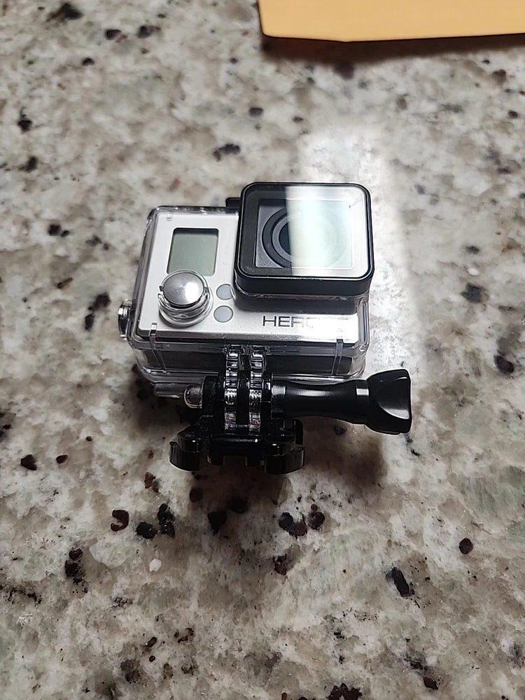 GoPro HERO 3+ Plus action camera in clear waterproof housing with lens and screen