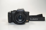 Panasonic LUMIX DMC-FZ20 5.0MP 12x Zoom Digital Bridge Camera (Black) w/ Strap