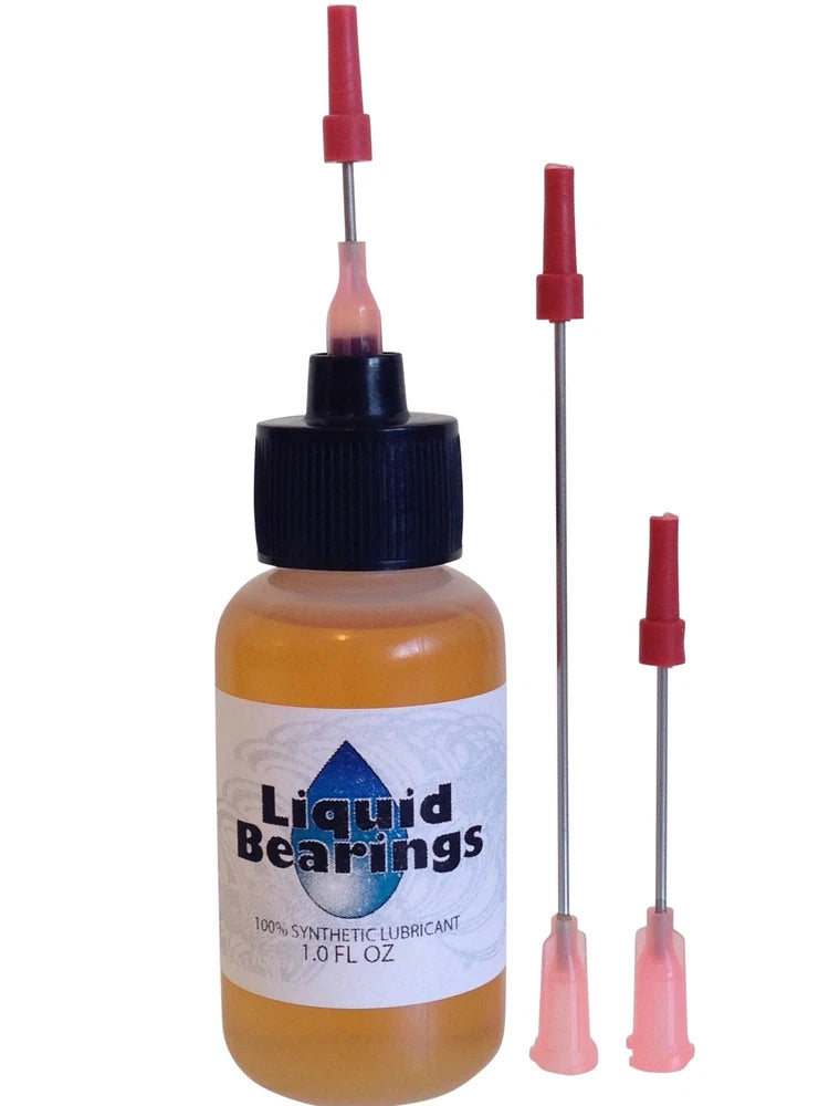 Synthetic lubricant oil bottle with three applicator needles, amber dropper liquid