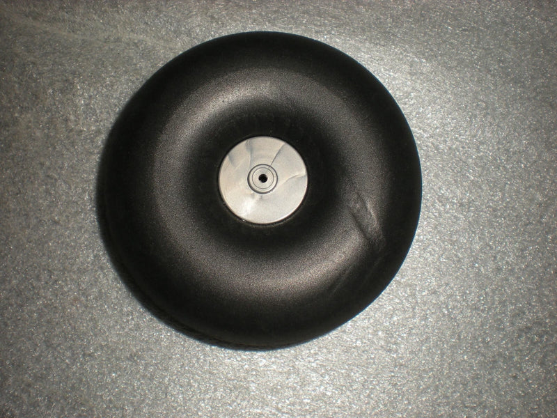Black RC landing wheel with metal hub, single tire