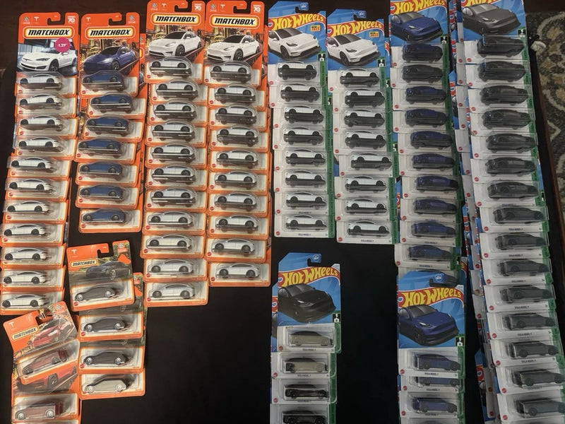 Hot Wheels and Matchbox die-cast car blister packs assortment