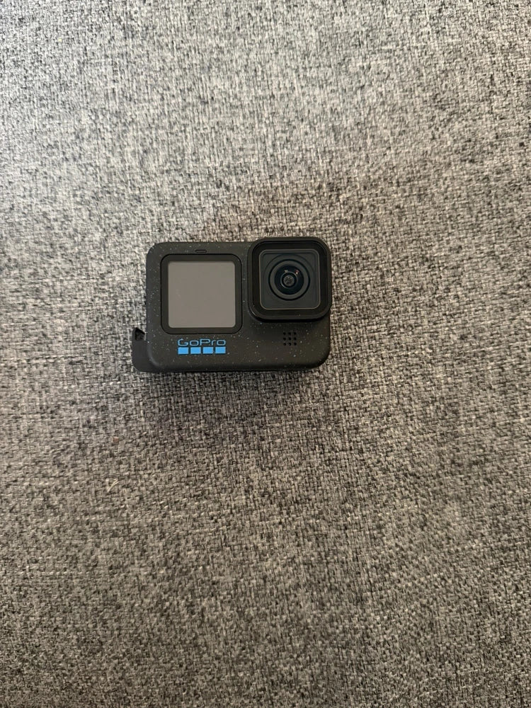 GoPro Hero12 Black action camera housing, front lens and status window visible