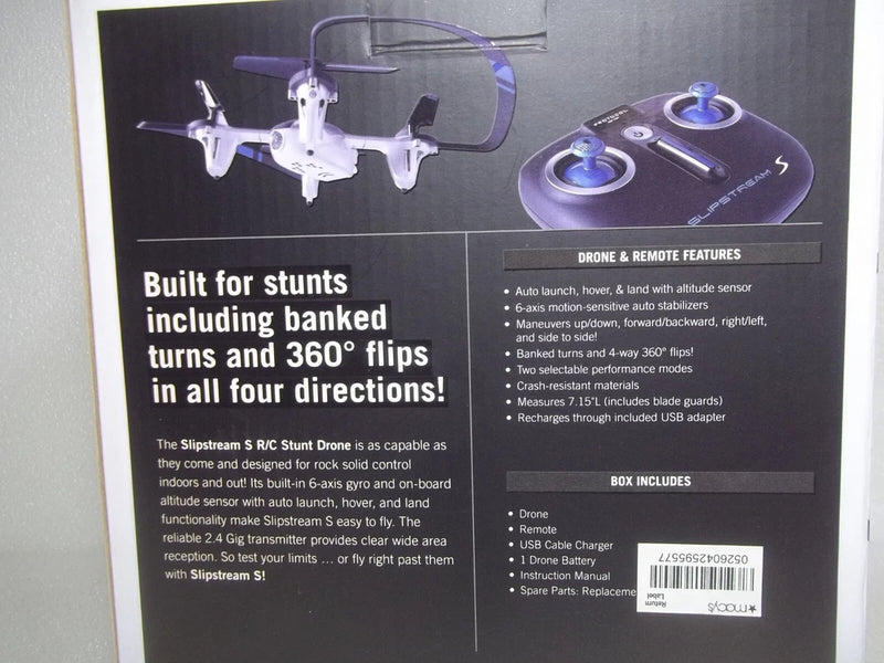 Boxed full-size quadcopter drone and handheld remote with two joysticks