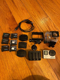 GoPro HERO4 Silver + Waterproof Housing + Batteries + Charger + Mounts.