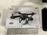 Foldable mini quadcopter drone with camera, blue accents, in SMHM box
