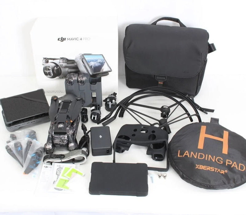 Drone kit set with black carrying case, controller, landing pad, and accessories
