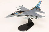 Gray F-16AM model airplane with blue tail and J-197 marking on black display stand