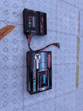 Two-slot battery balance charger with digital display and red charging leads