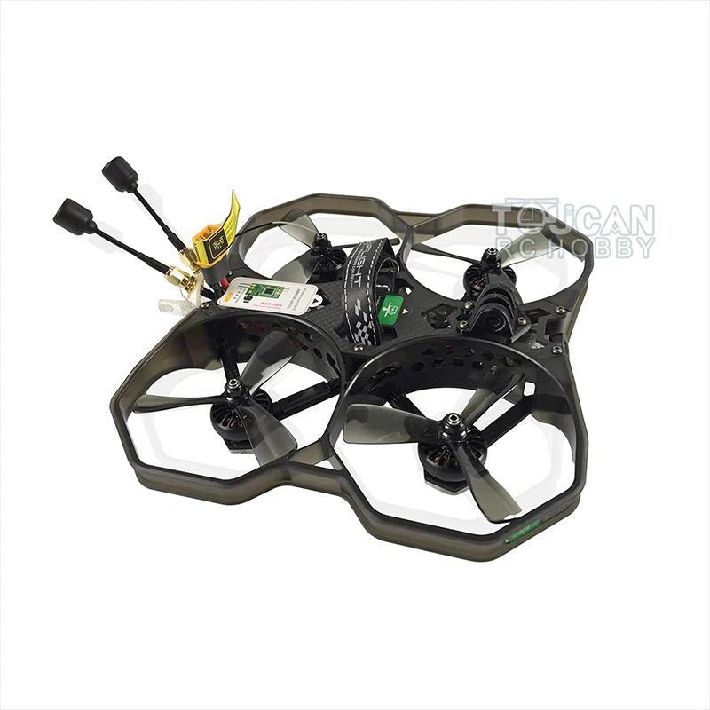 Race quadcopter drone with black frame, four propellers and antennas.