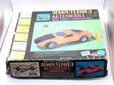 Vintage battery-operated computerized automobile model toy car in box with car artwork