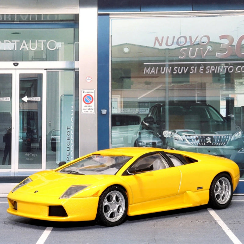 Lamborghini Murcielago die-cast model toy car, yellow with black stripe, front 3/4 view