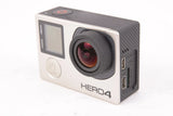 GoPro HERO4 action camera with front lens and LCD screen, silver and black