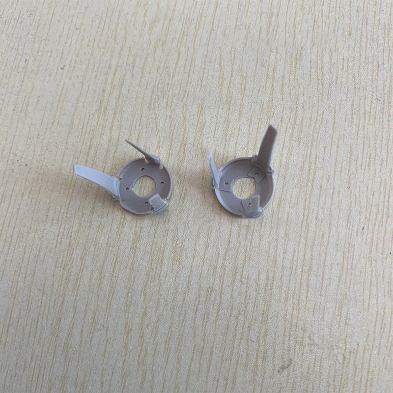 Drone gimbal damper accessory, two gray circular mounting parts