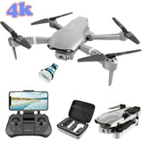 Gray 4K camera quadcopter with four propellers, handheld controller, and carrying case