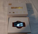 Wearable mini sports camera in open box with wristband DVR device