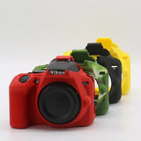 Nikon camera silicone case covers in red, green, black, and yellow