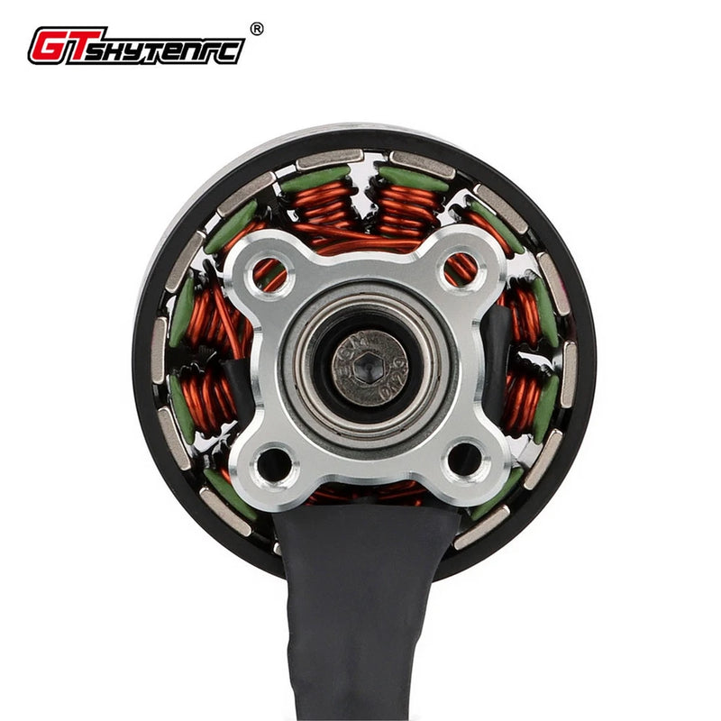 Brushless drone motor stator with red copper windings, black housing and mounting holes