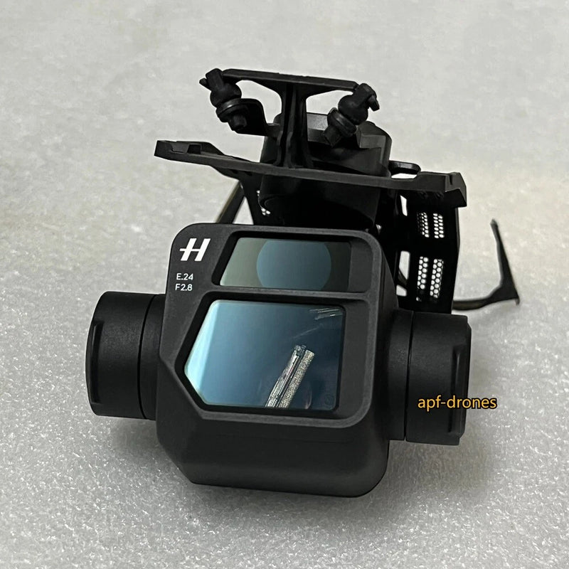 Black 3-axis gimbal camera arm assembly with mounted sensor module, no lens