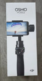 DJI Osmo Mobile gimbal stabilizer box with phone holder and handle