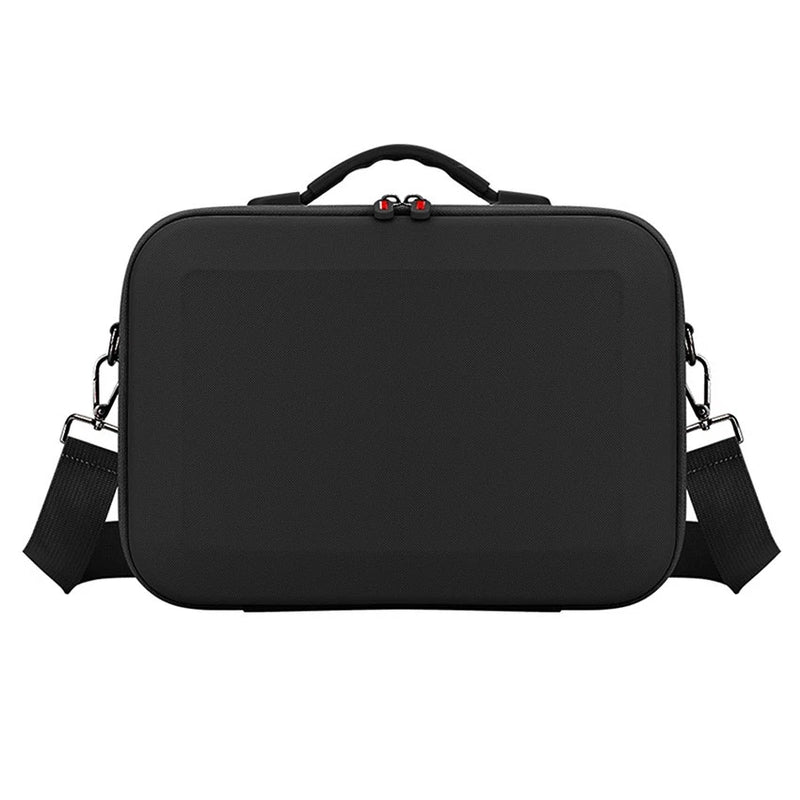 Black hard-shell shoulder bag with top handle, zipper closure, adjustable strap