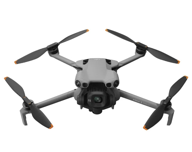 Foldable gray quadcopter drone with front camera and four black propellers extended