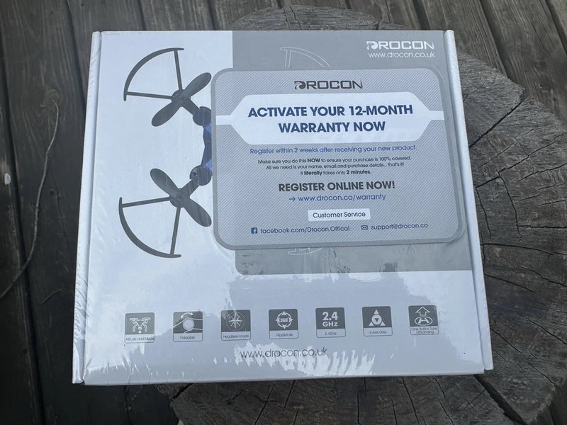 Drocon Scouter mini drone retail box with warranty activation card and drone graphic